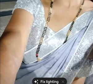 Elegant silver saree with sequence border