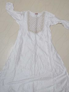 Elegant White Kurta with Embellished Neckline