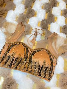 Coral fringes top lehenga set