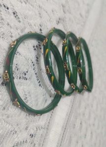 Elegant Green Bangles with Gold Detailing