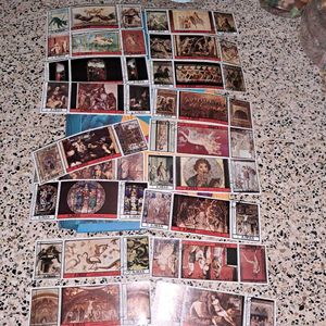 Collection of 54 vintage AJMAN painting stamps.