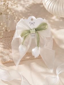 Elegant Bow Hair Clip with Floral Detail