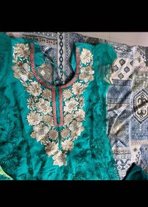 Elegant Teal Kurta Set with Intricate Embroidery