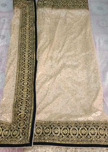 Elegant Cream & Gold Embroidered Saree