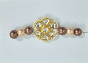 Elegant Pearl & Kundan Rakhi