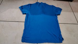 Blue Polo T-Shirt with '74' Graphic