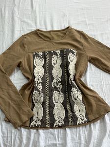 Brown long sleeve top with embroidered detail