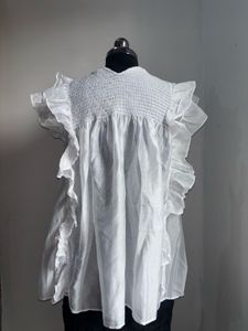 Elegant White Ruffle Top with Embellished Neckline