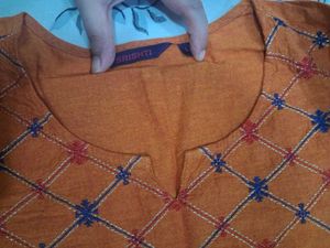 Elegant Rust Orange Kurta with Subtle Embroidery