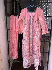 Elegant Pink Kurta Set with Intricate Embroidery