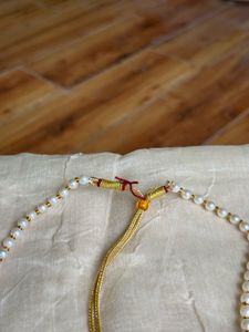 Elegant Pearl and Emerald Necklace