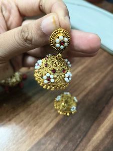 Elegant Jhumka Earrings with Red Beads