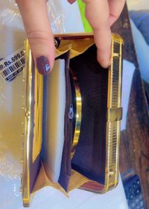 Elegant Gold Clutch with Embellishments