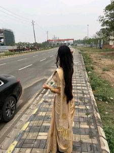 Elegant Beige Saree with Embellishments