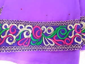Vibrant Purple Saree with Embroidered Border