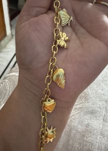 Charming Gold Tone Charm Bracelet