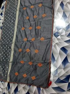 Elegant Grey Saree with Orange Motifs.. no blouse
