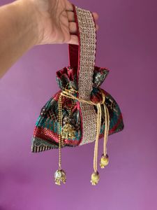 Luxury Brocade Potli Bag with Stone Jhumka Latkans