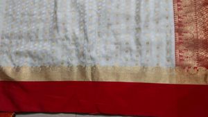 Elegant White &amp; Red Saree with Gold Border
