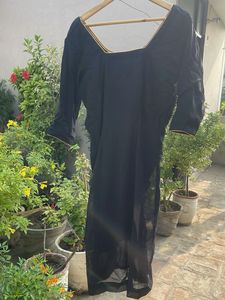 Elegant Black Blouse with Gold Trim