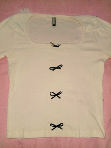 Cream Ribbed Top with Black Bows
