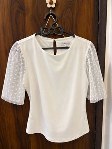 Chic White Top with Sheer Sleeves