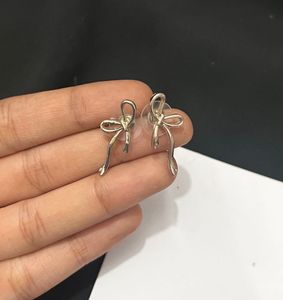 Silver Bow Stud Earrings