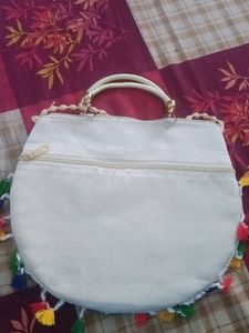 Embroidered Clutch with Tassels