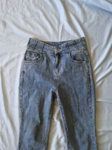 Flared Jeans with Studded Slits
