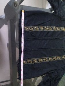 Elegant Black top with Gold Embellishments