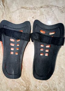 Orange Shin Guards