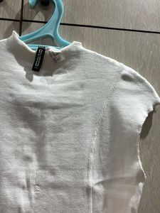 White Ribbed Sleeveless Mock Neck Top