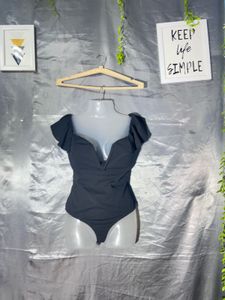 Chic Black Off-Shoulder Bodysuit