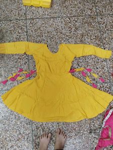 yellow frock  and  pink dhoti salwar