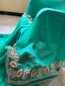 Elegant Teal Embellished Saree