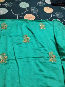 Elegant Teal Saree with Gold Embroidery