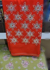 Vibrant Orange Embroidered Saree with blouse seque