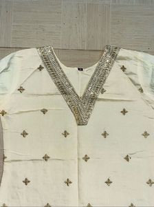 Elegant Cream Silk Kurta Set with Gold Embroidery