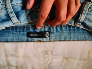 Ripped Light Wash Denim Jeans
