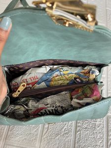 Green Roll shaped sling bag