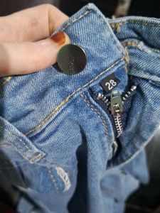 Ripped Light Wash Denim Jeans