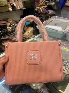 Stylish Pink Textured Handbag