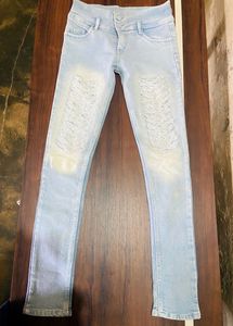 Damaged Pattern Ice Blue Colour Jeans’s….Waist: 26 Inches