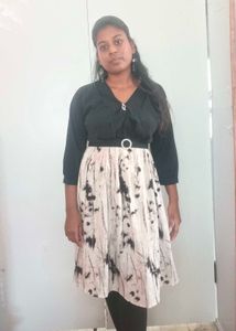Stylish V-neck Black Top with Printed Skirt