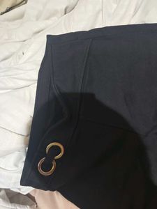 Chic Black Pants with Gold Detail