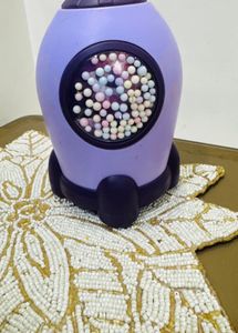 Cute Purple Rocket Piggy Bank with Colorful Balls
