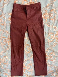 Chic Burgundy Coated Jeans