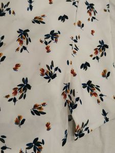 Looking for a trendy white top? Here it is