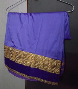 Elegant Purple Saree with Gold Border