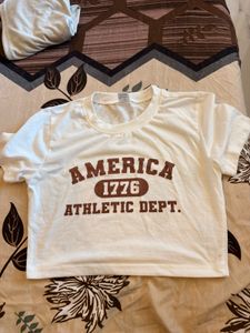 America 1776 Athletic Dept." Graphic Crop Top